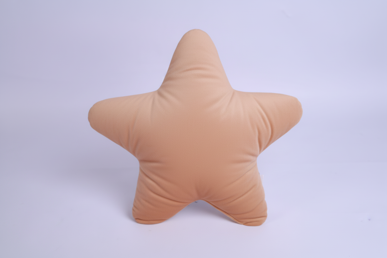 Star-shaped pillow with a face on a light purple background